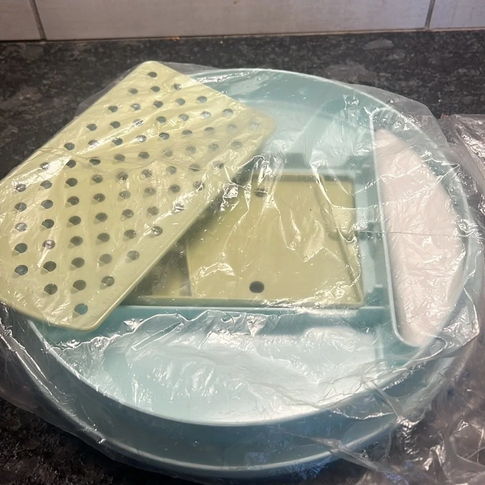 Kitchen work unit by Tupperware. Grate, slice. New in pkg. Use over bowl